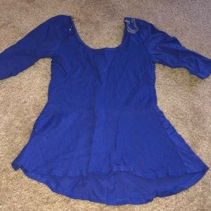 Tight on waist flowy on bottom half sleeve shirt